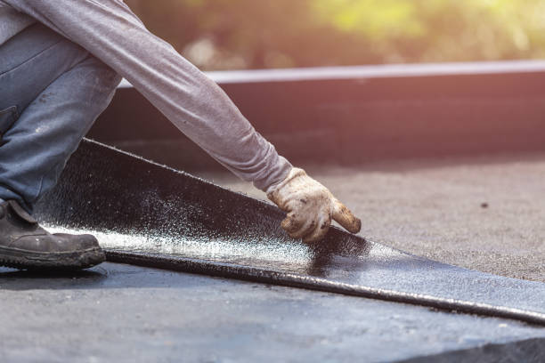 Professional Basement Waterproofing technician working in Gladstone, MI